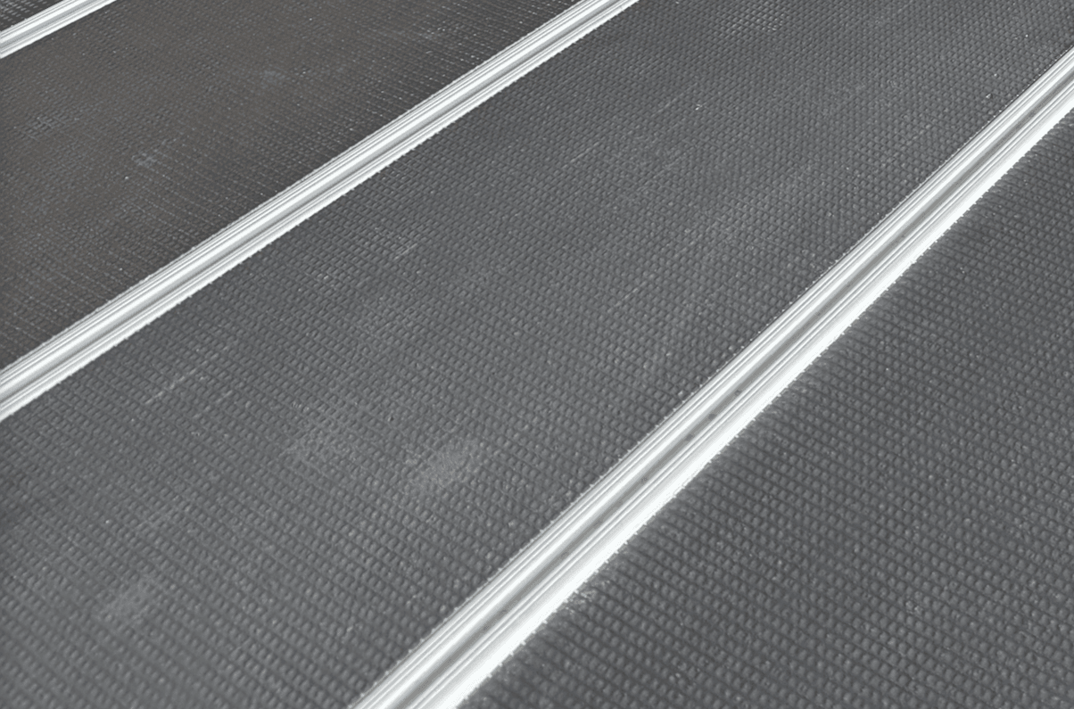 The back of two panels showing the aluminium track rails